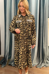 Long dress with leopard print and shiny accessories