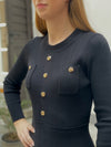 Knitted dress with sewn buttons May
