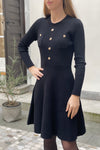 Knitted dress with sewn buttons May