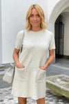 Dress with sewn beads in several colors