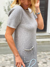 Dress with sewn beads in several colors