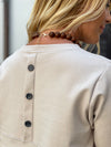 Gal pullover with a neckline in the front in two colors