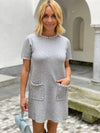 Dress with sewn beads in several colors