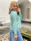 Blouse with ruffles in several colors