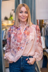 Blouse with floral print and embroidered details in several colors