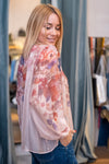 Blouse with floral print and embroidered details in several colors