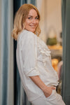 Cotton sweater with rolled sleeves and sewn detail in several colors