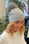 A cap with sequins and a cof in several colors