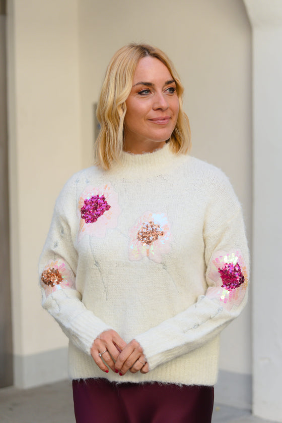 Pulover z našitimi bleščečimi cvetovi