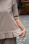 Bluza s plisiranim spodnjim delom