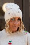 Pletena Kapa z okrasnimi detajli