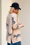Pulover z motivom zebre